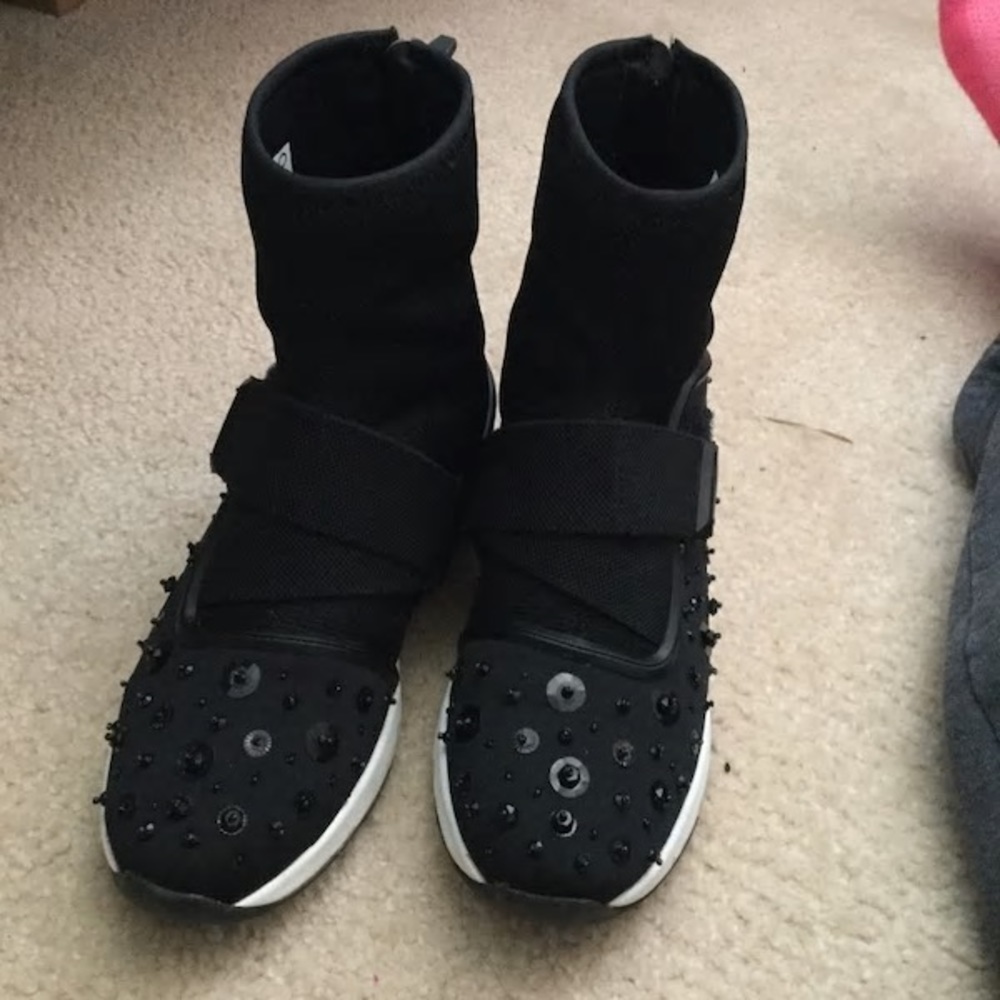 Black studded sneakers